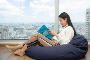A woman reading comfortably